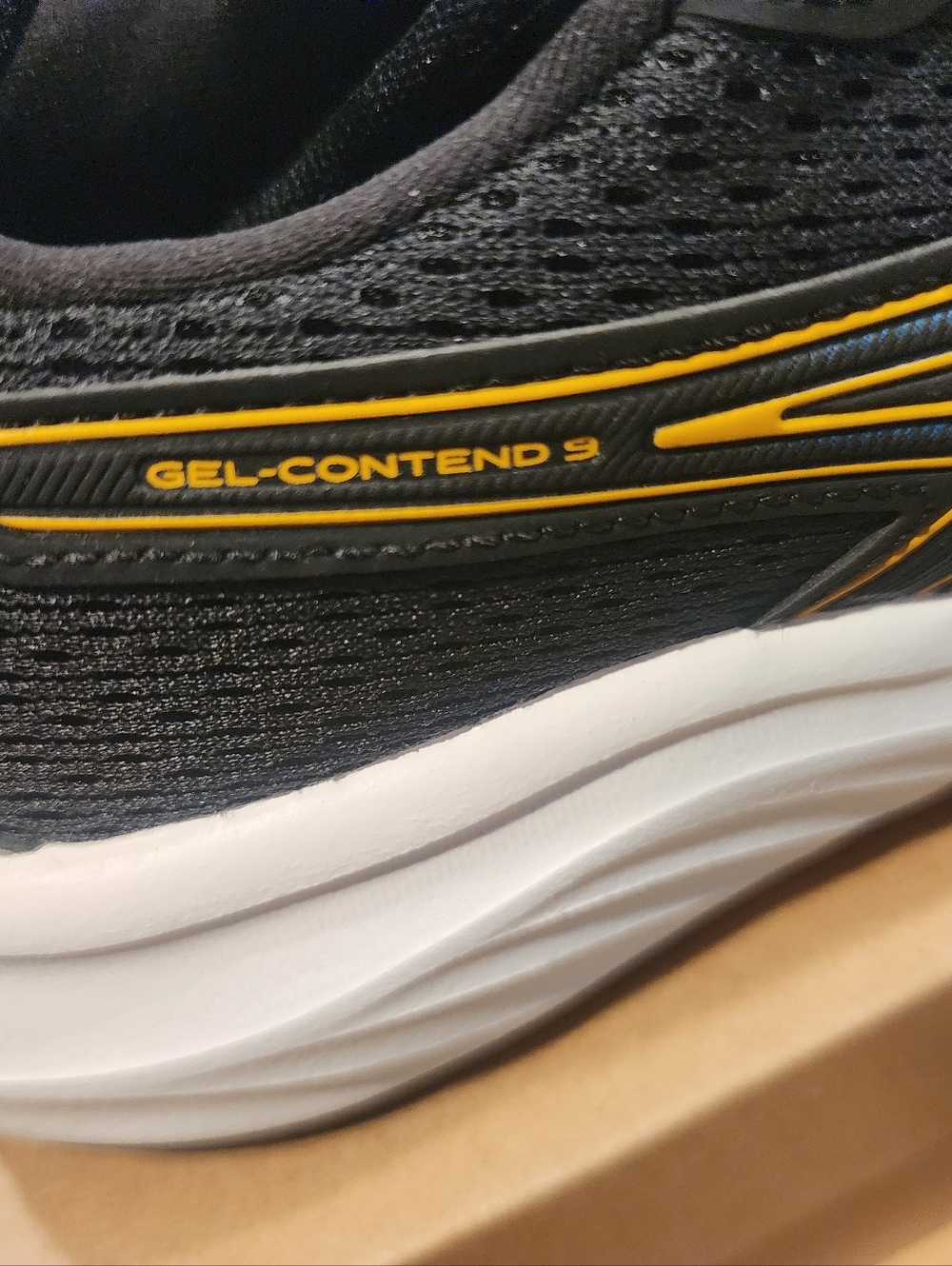 Asics Gel Contend 9 Black Running Shoes with Yellow & Blue Accents - Picture 4 of 7